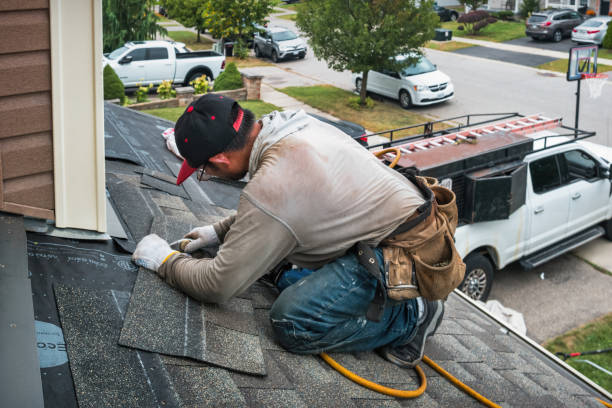 Professional Gutter Installation technician working in Needham Heights, MA